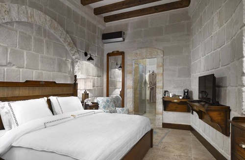 Mustafapasa Hotel | Boutique Cave Experience with Romantic Spa Nights & Pool Access!