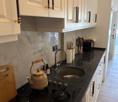 Fethiye City Center Apartment | Bright Modern Flat - Pool & Garden Near Shops