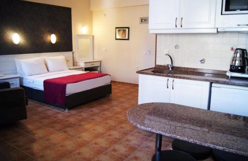Marmaris Apartment | Comfortable Family Room with Balcony with Access to Private Beach in Marmaris