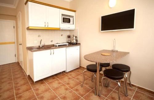 Marmaris Apartment | Comfortable Family Room with Balcony with Access to Private Beach in Marmaris