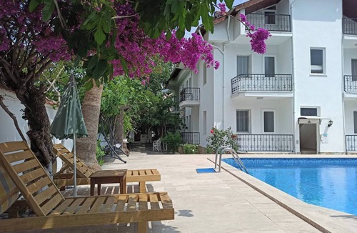 Ortaca Apartment | Garden-view suite room