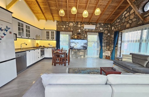 Fethiye House | Luxurious 2-bedroom stone villa with two pools, Turkish hamam & sauna