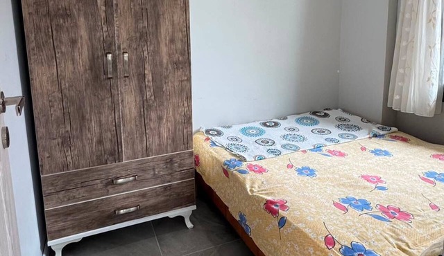 1+1 apartment with private garden in the center of Avşa Island, close to the sea