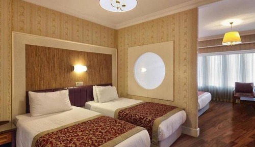 Deluxe Quadruple Room, City View