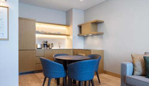 One-Bedroom King Apartment with Sofa Bed, Forest View and Balcony