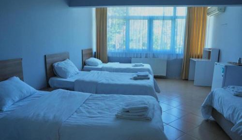 Quadruple Room with Private Bathroom