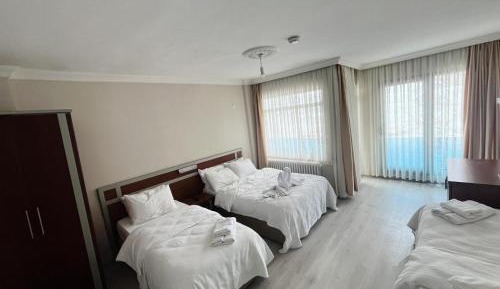 Quadruple Room with Balcony