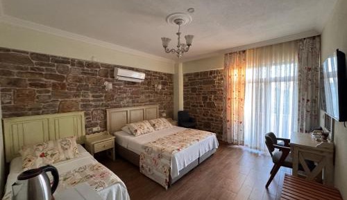 Deluxe Uc Kisilik Oda-Deniz Manzara