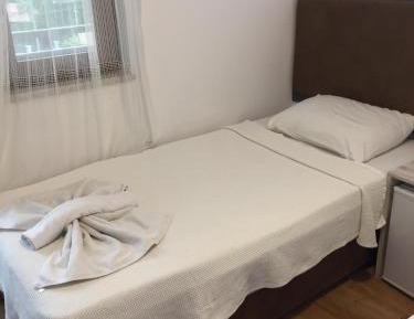 Single Bed in Dormitory Room
