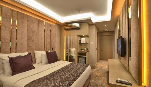 Superior Room with One King Bed and One Single Bed with Balcony and View