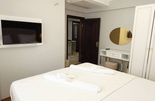 Kaymakli Apartment | فكرنا في راحتك في غرفنا المطلة على البحر والمدينة.