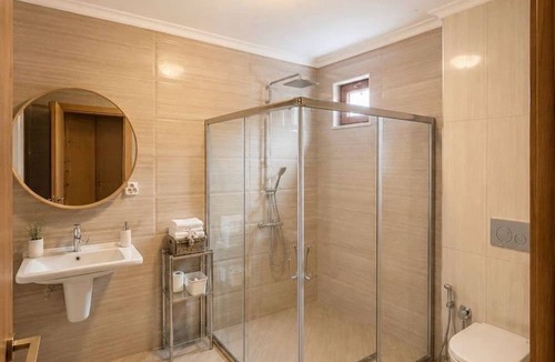 Iznik House | Spacious 9-Bedroom Estate with Heated Retractable Pool & Lake Views