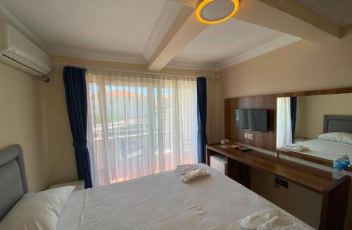 Kucukkuyu Hotel | Deniz Kenarı Beach & Garden